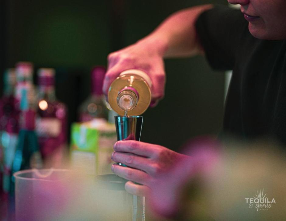 Bartender making a cocktail for a ready to drink cocktail with tequila